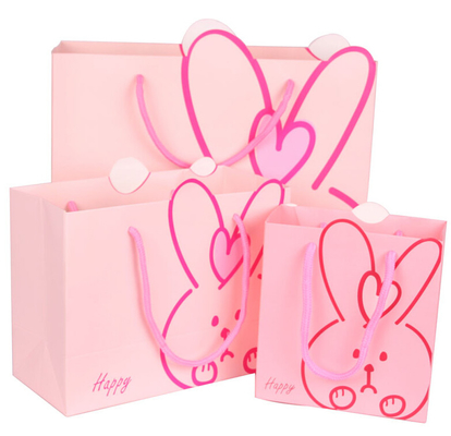 Kaninchen-Muster-nettes Papiergeschenk sacken kundenspezifische Papiereinkaufstaschen für Einzelhandelsgeschäft ein